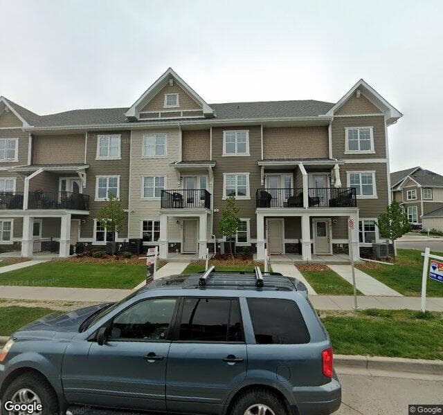 Street view of 869 Cranston Avenue SE, Calgary