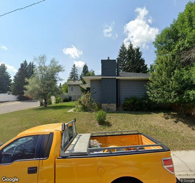 Street view of 716 Cantree Road SW, Calgary