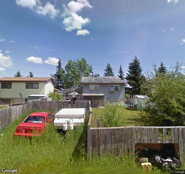 Street view of 215 Erin Woods Drive SE, Calgary