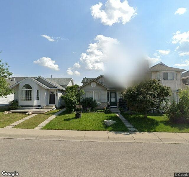 Street view of 96 Rivercrest Crescent SE, Calgary