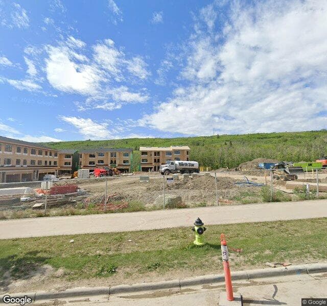 Street view of 401-1453 Na'a Drive SW, Calgary