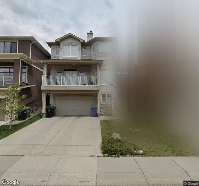 Street view of 54 Rockyledge Rise NW, Calgary