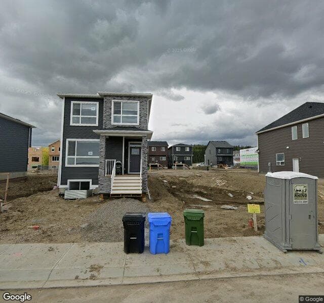 Street view of 50 Creekview Gardens SW, Calgary