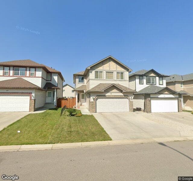 Street view of 58 Everwoods Park SW, Calgary
