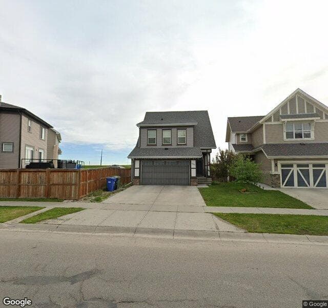 Street view of 665 Copperpond Boulevard SE, Calgary