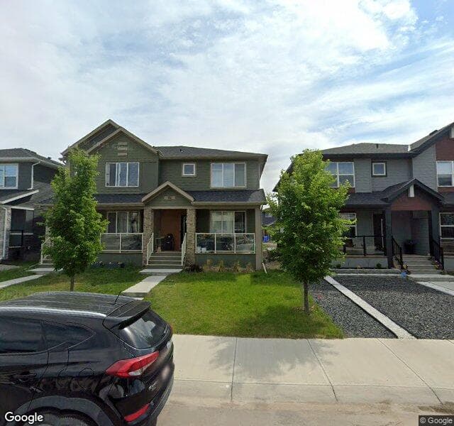 Street view of 52 Wolf Creek Drive SE, Calgary
