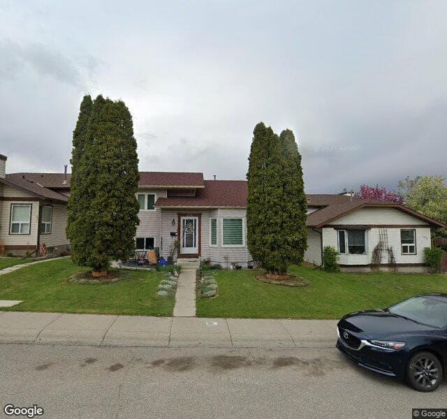 Street view of 203 Shawglen Road SW, Calgary