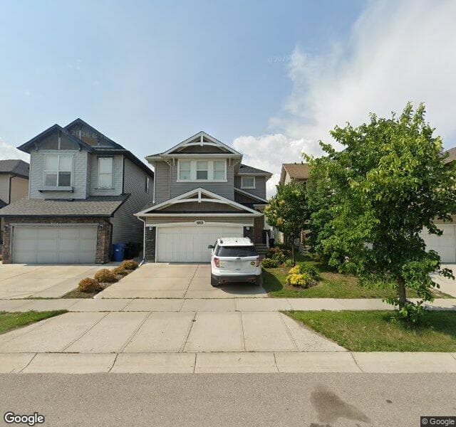Street view of 725 New Brighton Drive SE, Calgary