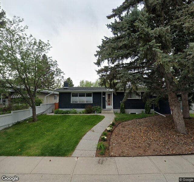 Street view of 411 Woodland Crescent SE, Calgary