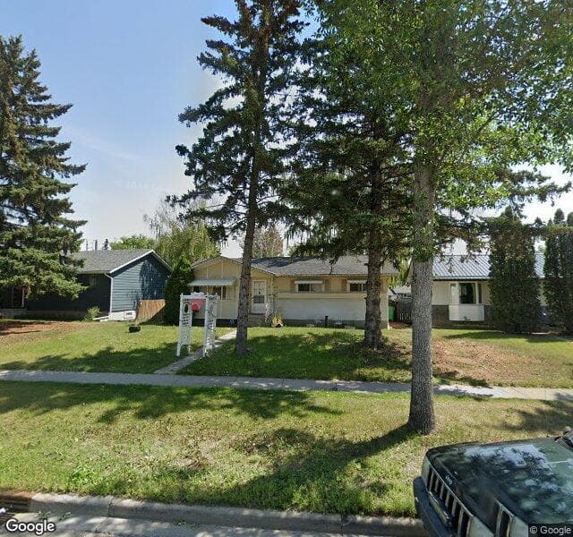 Street view of 9020 Fairmount Drive SE, Calgary