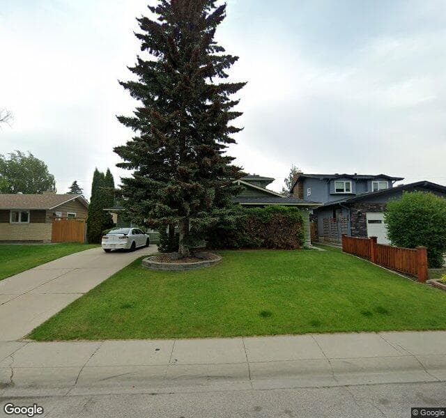 Street view of 816 Lake Ontario Drive SE, Calgary