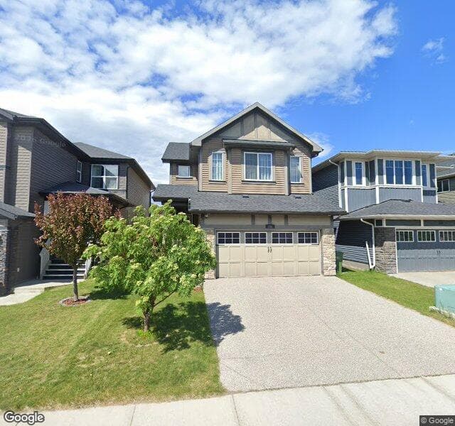 Street view of 156 Cougar Ridge Manor SW, Calgary