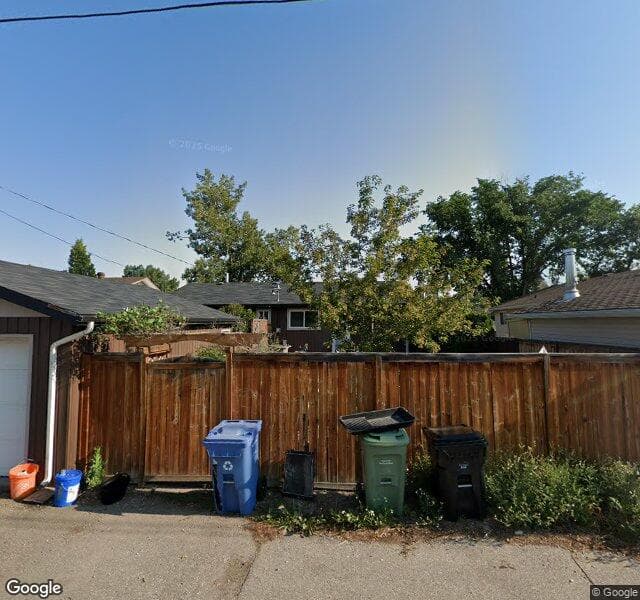 Street view of 23 Queen Isabella Close SE, Calgary