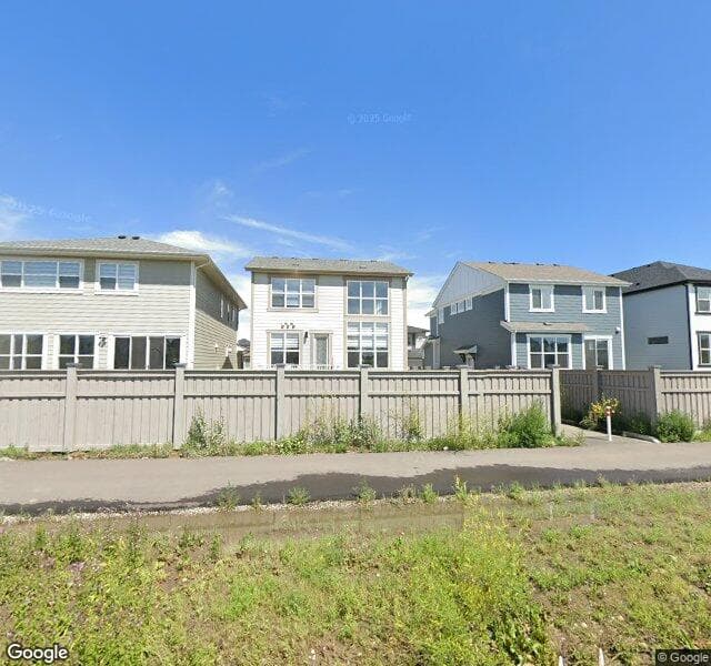 Street view of 332 Magnolia Crescent SE, Calgary