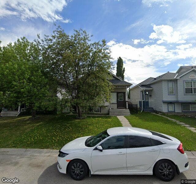 Street view of 307 Covehaven View NE, Calgary