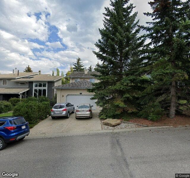 Street view of 660 Coach Grove Road SW, Calgary