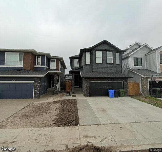 Street view of 1129 Cranbrook Gardens SE, Calgary