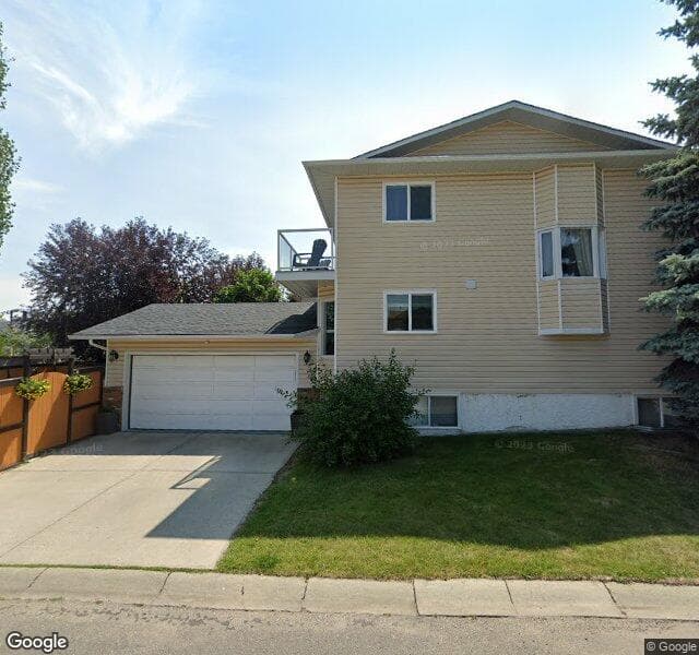 Street view of 4 Cedargrove Way SW, Calgary