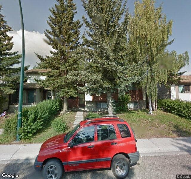 Street view of 84 Falconridge Place NE, Calgary