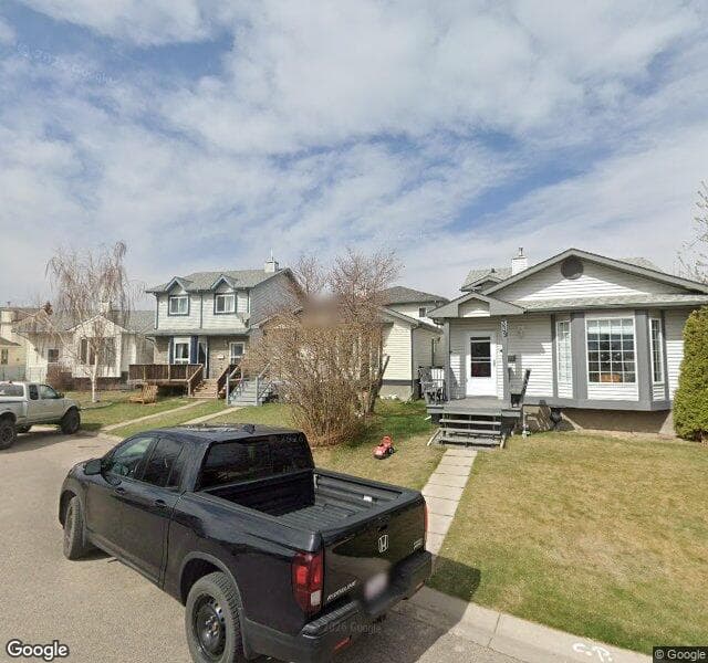 Street view of 335 Covington Bay NE, Calgary