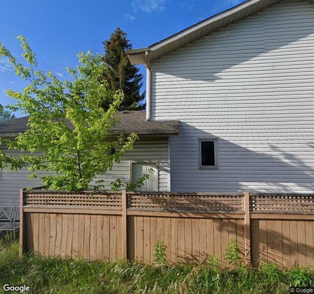 Street view of 1403 Sunvista Way SE, Calgary