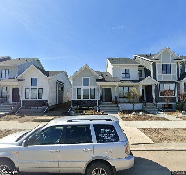 Street view of 1066 Creekside Boulevard SW, Calgary