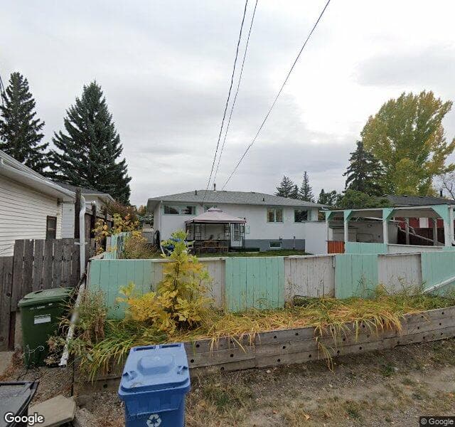 Street view of 126 Springwood Drive SW, Calgary