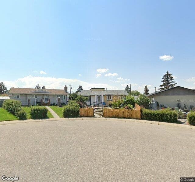 Street view of 7807 Olympia Bay SE, Calgary