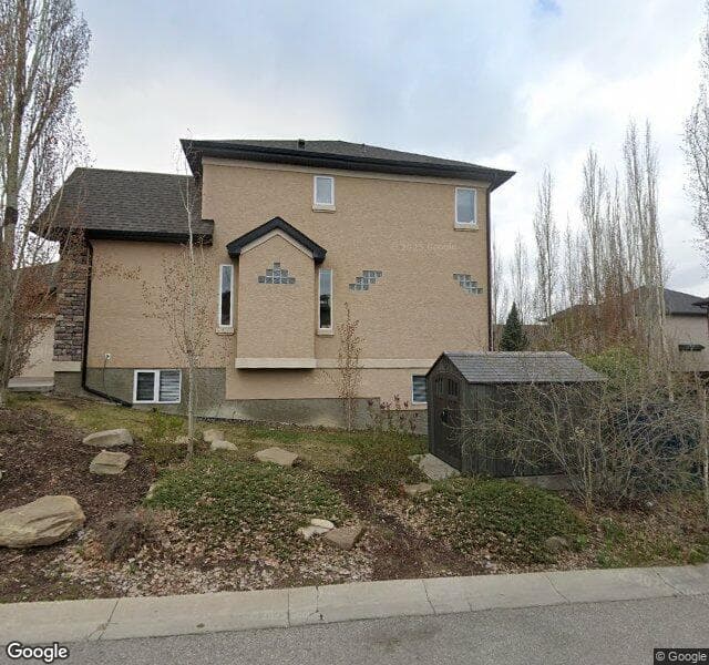 Street view of 32 Evercreek Bluffs Crescent SW, Calgary