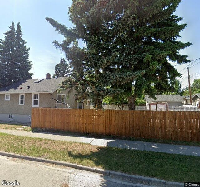 Street view of 702 17 Avenue NW, Calgary