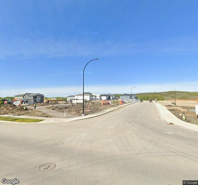 Street view of 49 Creekside Passage SW, Calgary