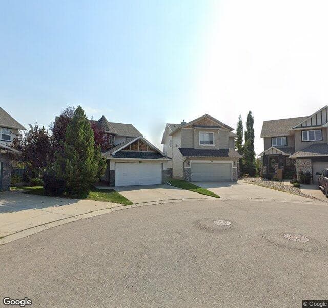 Street view of 18 Cougarstone Bay SW, Calgary