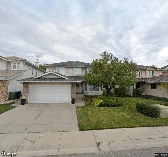 Street view of 174 Woodpark Circle SW, Calgary