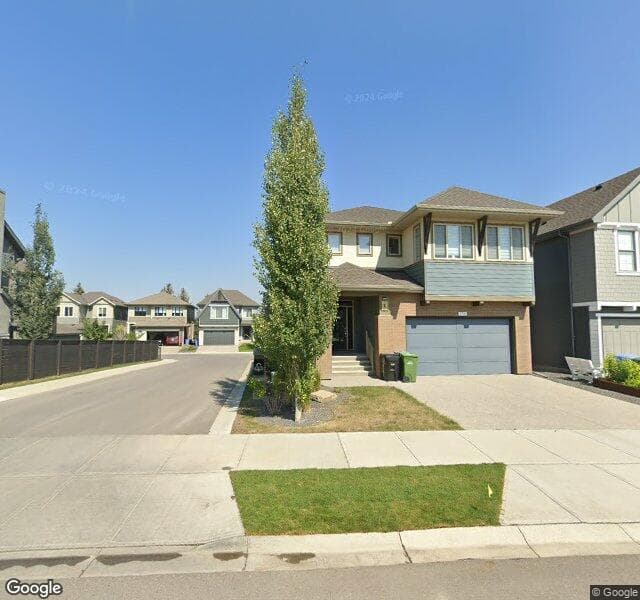 Street view of 338 Shawnee Boulevard SW, Calgary