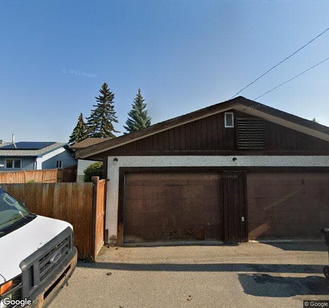 Street view of 35 Queen Isabella Close SE, Calgary
