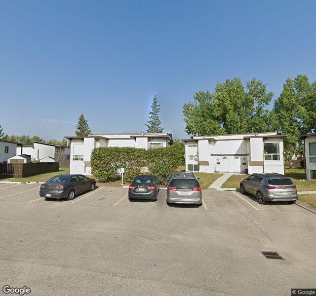 Street view of 129 Oaktree Lane SW, Calgary