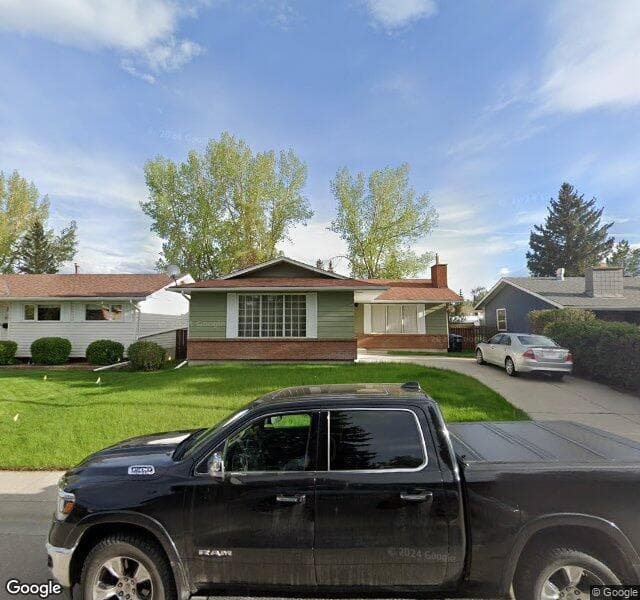Street view of 124 Oakmoor Place SW, Calgary