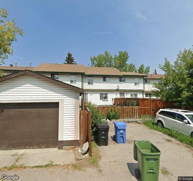 Street view of 33 Woodhill Court SW, Calgary