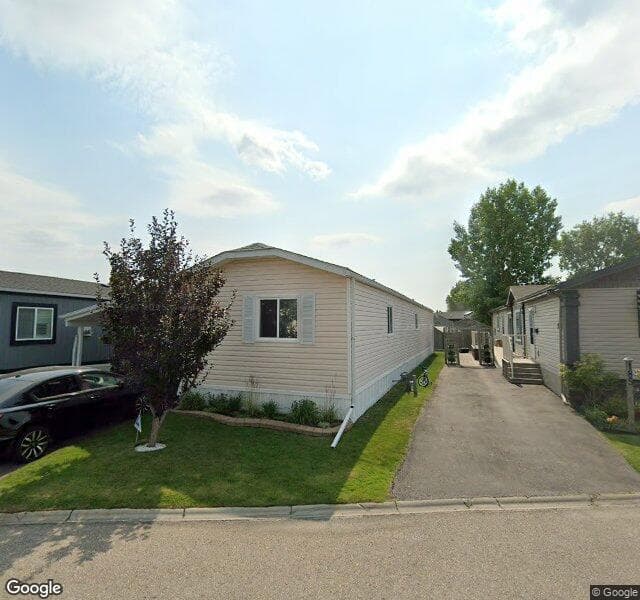 Street view of 99 Arbour Lake Road NW, Calgary