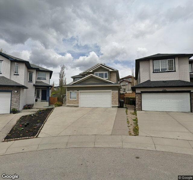 Street view of 630 Rocky Ridge View NW, Calgary