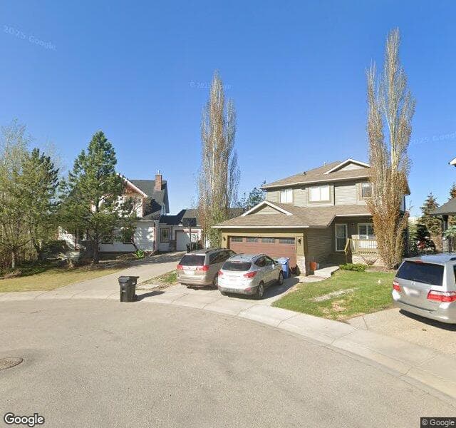Street view of 10 Hidden Creek View NW, Calgary