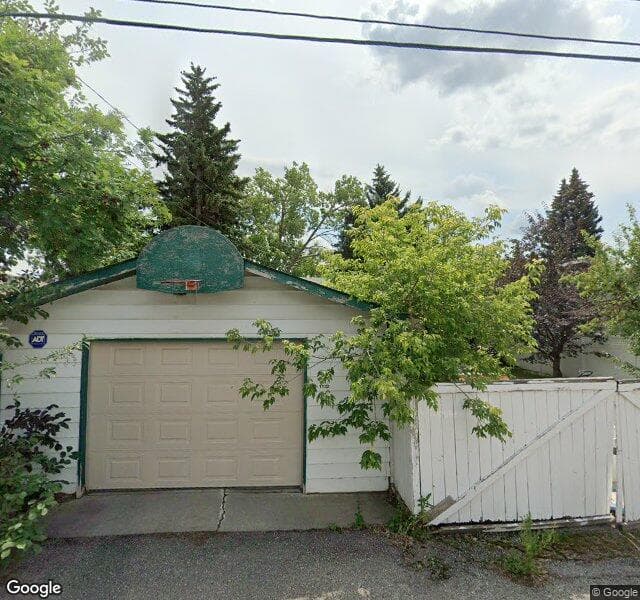 Street view of 1132 Lake Sylvan Place SE, Calgary