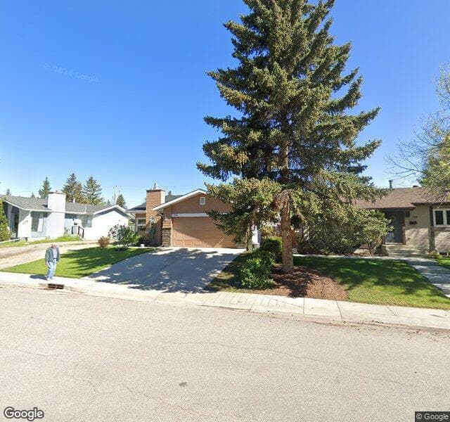 Street view of 104 Cedarpark Drive SW, Calgary