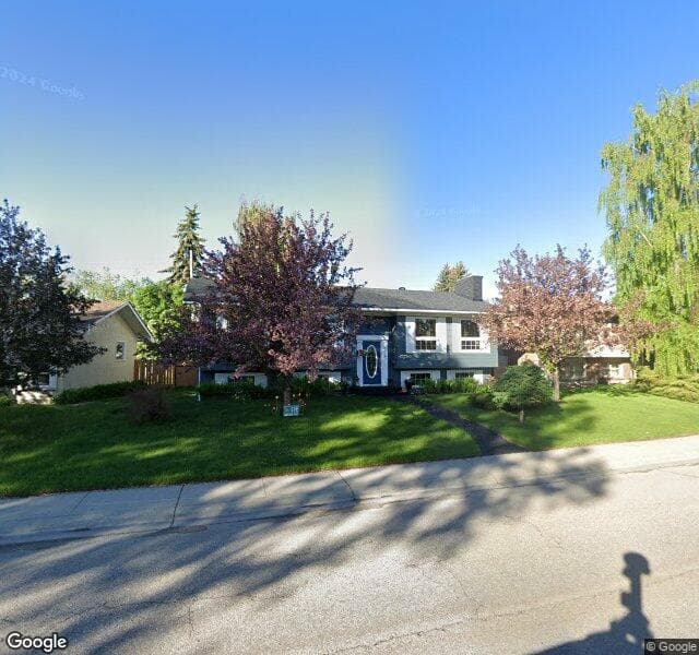 Street view of 1824 Lake Bonavista Drive SE, Calgary