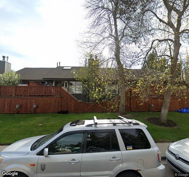Street view of 57-2225 Oakmoor Drive SW, Calgary