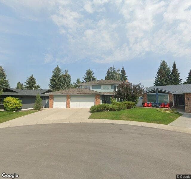 Street view of 28 Woodmont Place SW, Calgary