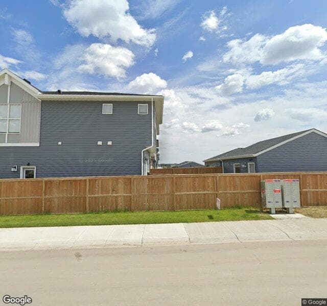 Street view of 326 Creekside Boulevard SW, Calgary