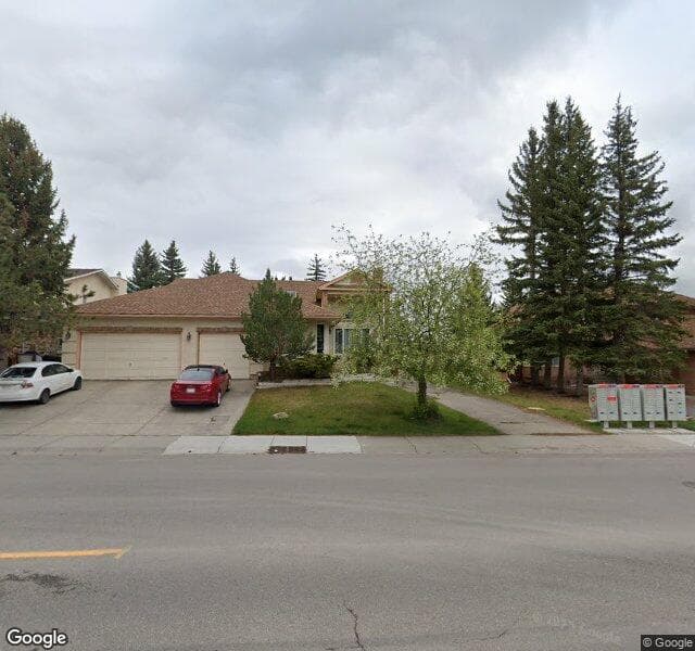 Street view of 876 Shawnee Drive SW, Calgary