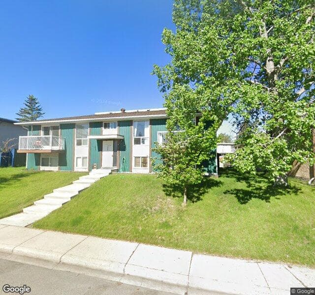 Street view of 1-11415 8 Street SW, Calgary
