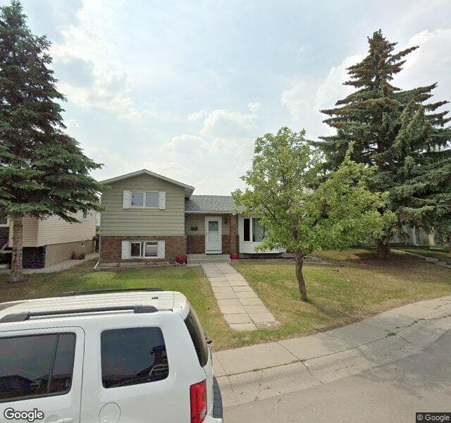Street view of 983 Rundlecairn Way NE, Calgary